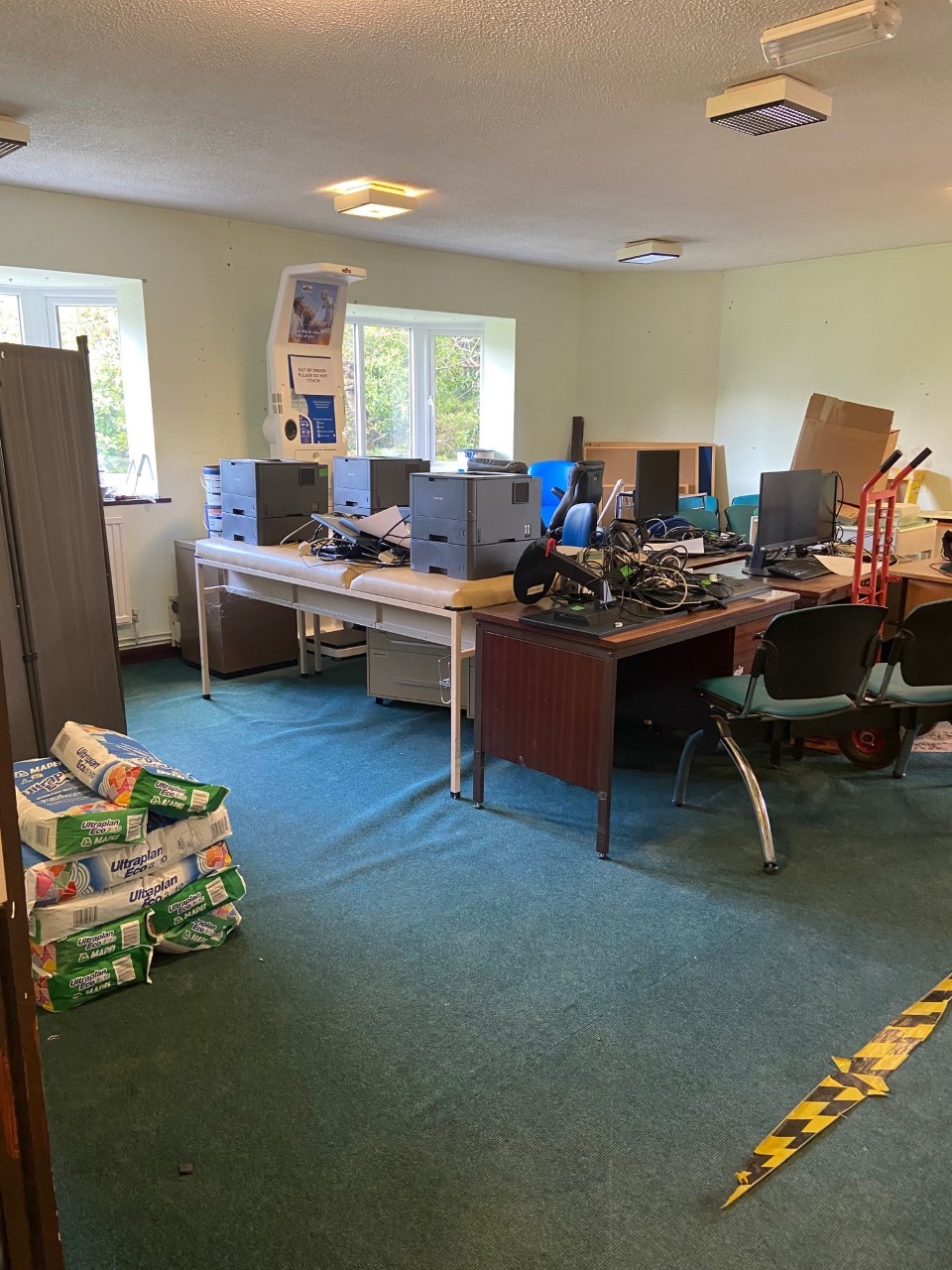 Picture of green lane reception, disorganised due to renovation.